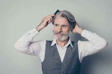 Portrait of old gentleman prepare for business meeting comb brush clear hygiene haircut wear shirt vest waistcoat isolated over grey color background