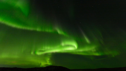 Aurora at night in the sky in the north.