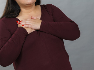 Adult woman having pain in chest