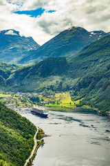 Fjord Geirangerfjord with ferry boat, Norway.