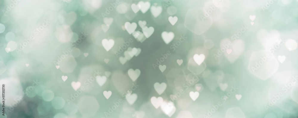Wall mural abstract background with bokeh and green hearts
