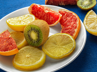 Kiwi and slices of citrus fruits