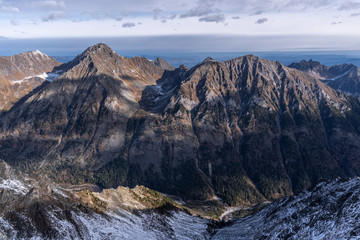 View from the mountain to the gorge in the Eastern Sayan Mountains