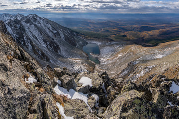 Mountain lake under Ulyabor peak in the Eastern Sayan Mountains