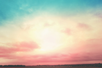Obraz premium Colorful cloudy sky at sunset. Gradient color. Sky texture. Abstract natural background