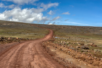 Naklejka premium Landscape with road to top of the Ethiopian Bale Mountains National Park. Ethiopia wilderness pure nature. Sunny day with blue sky.