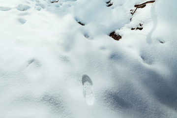 Footstep on the fresh friable snow