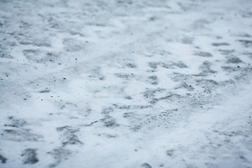 Tire tracks on dirty snow