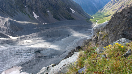 Beautiful alpine landscape. View from above at mountain valley.