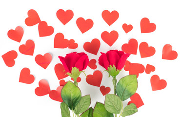 Red roses and red hearts on a white background.