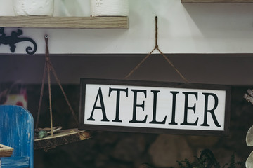 Panneau en métal vintage avec texte atelier