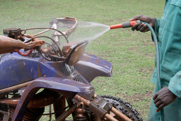 Washing a Muddy Quad Bike © Helen