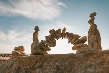 Low angle shot of beautiful rock formations under the beautiful bright sky