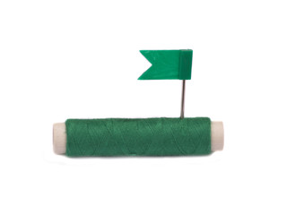 Garnrolle mit Fähnchen