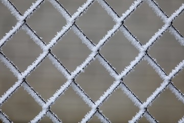 White frost on a square wire mesh with condensation of humid air at appropriate temperature conditions