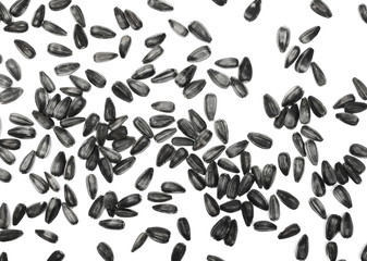 Obraz na płótnie Canvas Sunflower seeds isolated on white background, top view