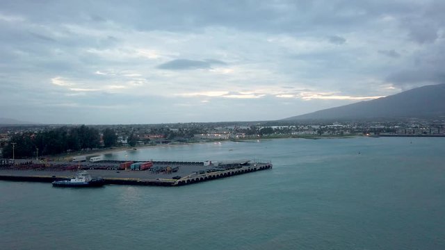 Cityscape from cruise ship in Maui, Hawaii. Kahului Harbor is located on Maui's north central coast. Kahului Harbor is primarily a commercial harbor and port.