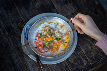 Pan-fried eggs, breakfast Thai style (Kai Grata).