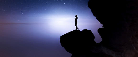 Woman on top of the cliff,3d rendering