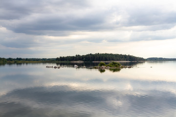 panoramic view of the lake with reflection of clouds