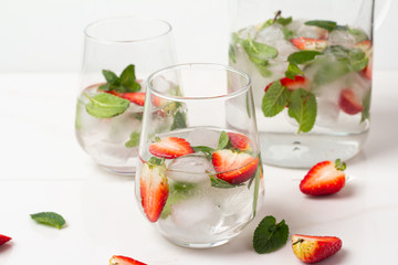 close up drink with berries and mint