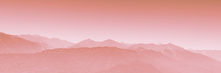 Mountain range with morning haze, panoramic view. Tinting