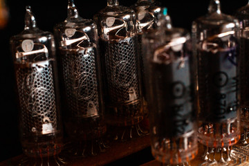 Nixie tubes IN-16 on a printed circuit board with electronic components