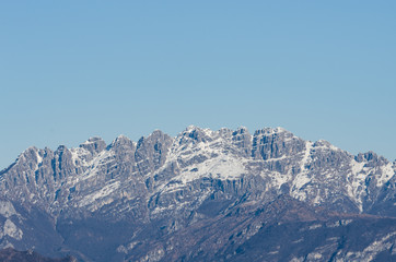 northern italy prealps with pristine blue sky peaks