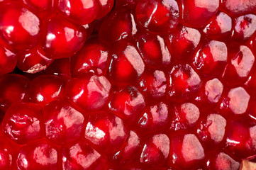 Pomegranate fruit. Pomegranates over black Background. Organic Bio fruits