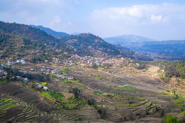 Fototapeta premium Terrace rice farm barren after harvest season in Nepal.