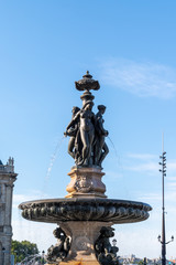 Fototapeta na wymiar fontain on square Place de la Bourse Les Trois Graces in Bordeaux city center France