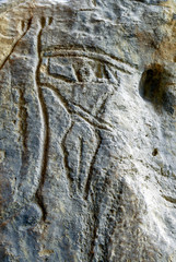 Naked man and woman. Prehistoric Petroglyphs (rock painting) are included in UNESCO World Heritage List. Gobustan National Park, Azerbaijan, Caucasus.