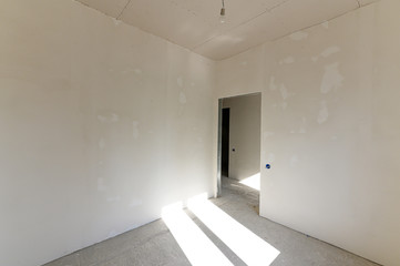 Russia, Moscow- September 10, 2019: interior room rough repair for self-finishing. interior decoration, bare walls of the room, stage of construction