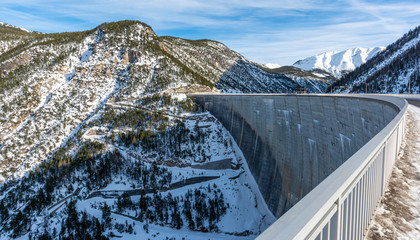 Water dam in winter. Italy Alps