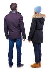 Back view of couple in winter jacket.