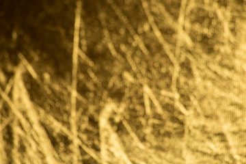 An abstract golden yellow bokeh background