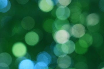 Green blurred background, the bokeh effect