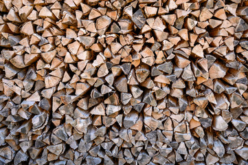 Stacks of chopped firewood stored for the winter