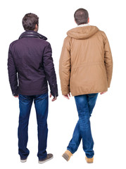 Back view of couple in winter jacket.