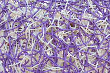 fine craft texture that made from purple and white plastic 