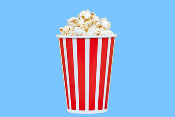 Closeup red paper cup with popcorn
