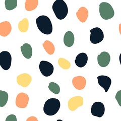 Abstract seamless four-color pattern on a white background. A pattern of deep blue, green, yellow and apricot colored spots. Background for your design.