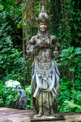 Balinese statue of good spirit on pedestal