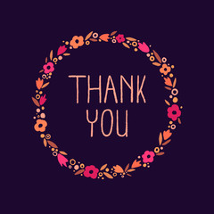 Flower wreath with the inscription 