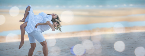 Valentine's Day, Happy young couple holding each other and laughing with enjoying together on the summer beach vacation.