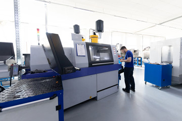 the operator of the machine performs debugging and tuning of the machine with program control