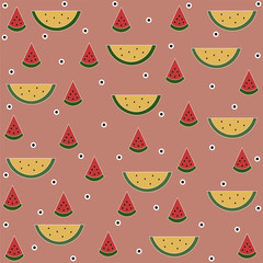 Red and yellow watermelon slices on pink background