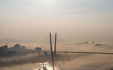 Fototapeta na wymiar Cityscape daylight view. Fog over the city.