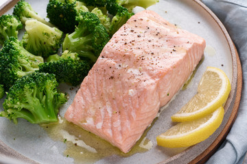 Steam salmon, broccoli, paleo, keto, lshf or dash diet. Mediterranean, Clean eating, balanced food.