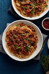 Pasta Bolognese Linguine with mincemeat and tomatoes, parmesan cheese. Italian dinner for two